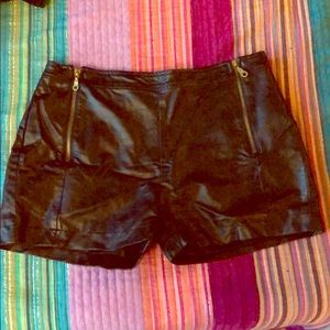 Black faux leather shorts